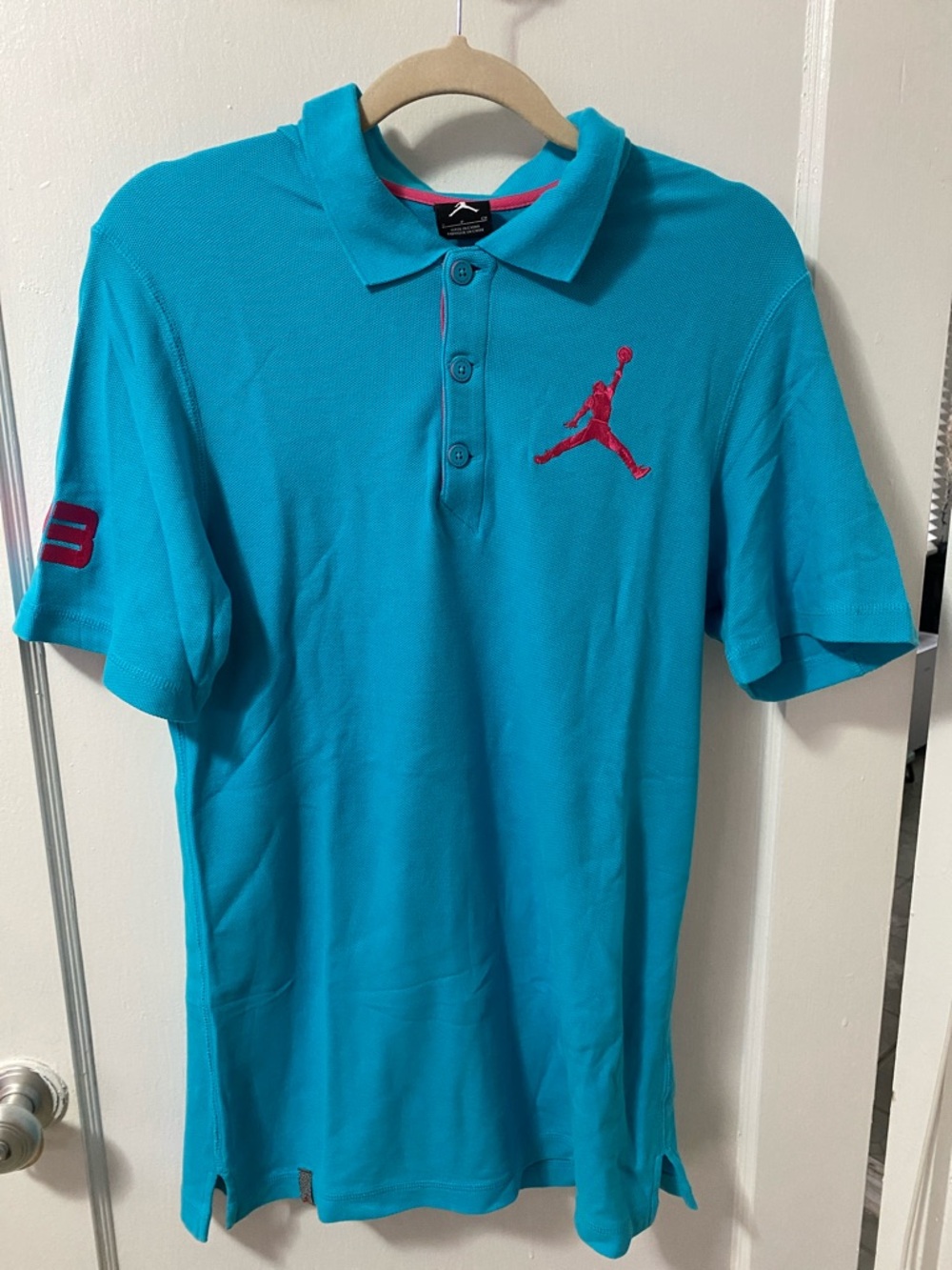 Jordan Men's Teal Polo with pink Jumpman Embroidery
